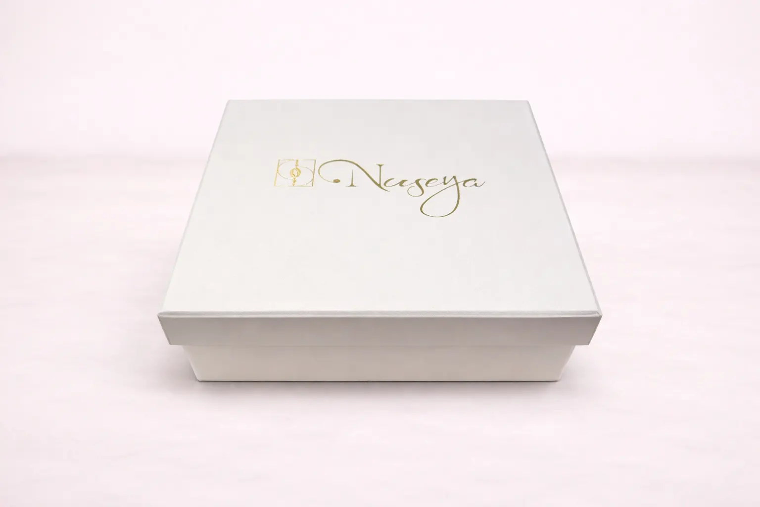 a_digital_photograph_displays_two_open_gold_colore